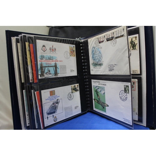 427 - AN ALBUM CONTAINING ROYAL NAVY FIRST DAY COVERS