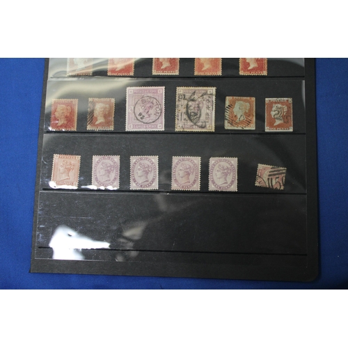 433 - A PAGE OF EARLY VICTORIAN STAMPS TO INCLUDE IVORY HEAD REVERSES AND TWO 2/6 PURPLE STAMPS