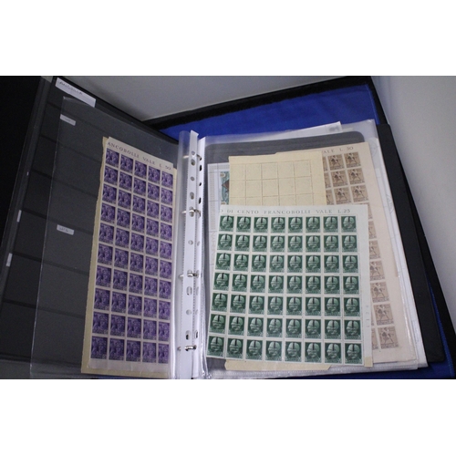 453 - A COLLECTION OF FULL AND PART SHEETS OF WORLD STAMPS IN A RED BINDER