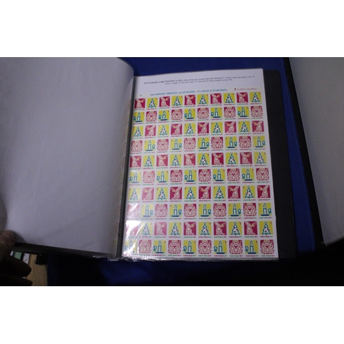 453 - A COLLECTION OF FULL AND PART SHEETS OF WORLD STAMPS IN A RED BINDER