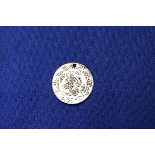 465 - AN OTTOMAN EMPIRE ONE KURUS SILVER COIN, DRILLED