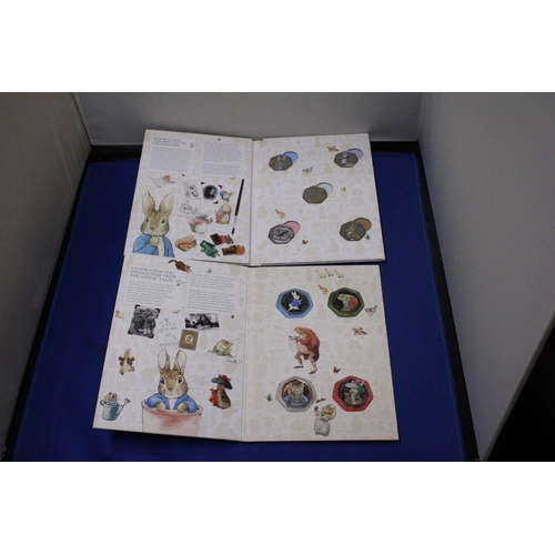 466 - TWO ROYAL MINT TREASURE FOR LIFE COLLECTOR'S ALBUMS CONTAINING FIFTY PENCE PIECES CELEBRATING BEATRI... 