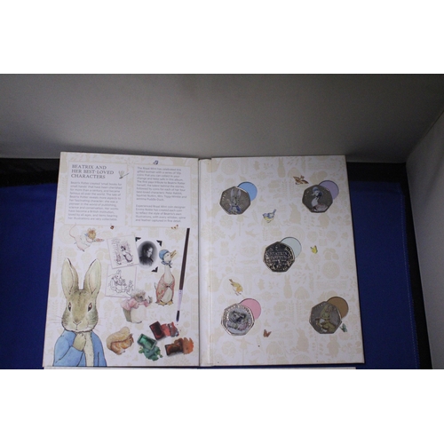 466 - TWO ROYAL MINT TREASURE FOR LIFE COLLECTOR'S ALBUMS CONTAINING FIFTY PENCE PIECES CELEBRATING BEATRI... 