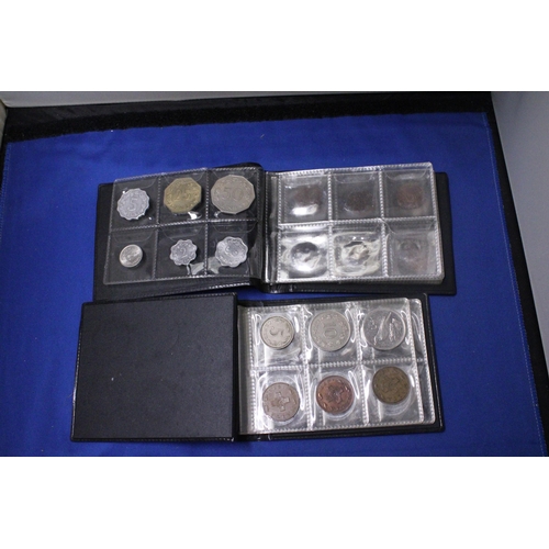 479 - TWO ALBUMS CONTAINING COINS OF MALTA