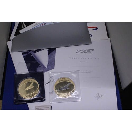 485 - TWO LARGE GOLD PLATED COINS THE FINAL FLIGHT TO COMMENORATE CONCORDES FINAL FLIGHT TO TOULOUSE 27.06... 