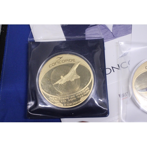 485 - TWO LARGE GOLD PLATED COINS THE FINAL FLIGHT TO COMMENORATE CONCORDES FINAL FLIGHT TO TOULOUSE 27.06... 