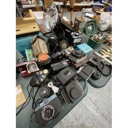 167 - A LARGE LOT OF VINTAGE CAMERAS AND LENSES