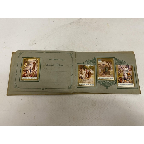 170 - A 1917 BIBLE STAMP ALBUM WITH STAMPS