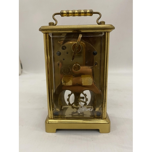 174 - A VINTAGE GERMAN SCHATZ & SOHNE BRASS 8 DAY CARRIAGE CLOCK IN WORKING ORDER NO WARRANTY GIVEN WITH W... 