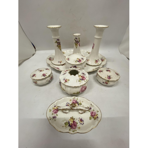 186 - A FLORAL PATTERNED, CERAMIC DRESSING TABLE SET TO INCLUDE A TRAY, CANDLESTICKS, HAT PIN HOLDER, TRIN... 