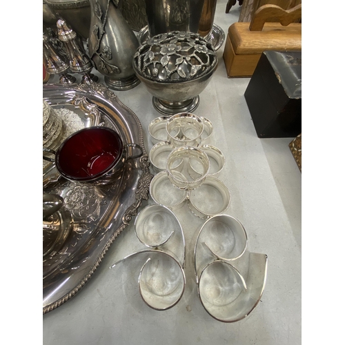 192 - A QUANTITY OF SILVER PLATED ITEMS TO INCLUDE A LARGE TRAY, NAPKIN RINGS, COFFEE POT, A PLANTER, VASE... 