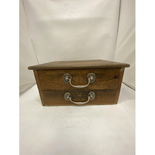 196 - A VINTAGE OAK TWO DRAWER CASH TILL