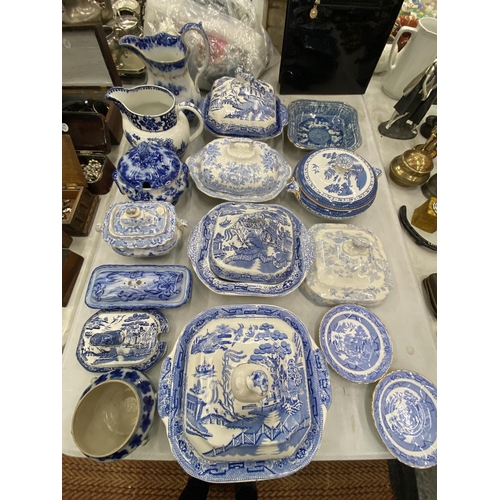 221 - A QUANTITY OF BLUE AND WHITE ANTIQUE CERAMICS TO INCLUDE JUGS, TUREENS ETC