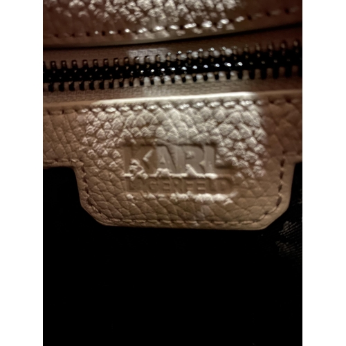 227 - AN AS NEW GENUINE BEIGE COLOURED KARL LAGERFELD BAG