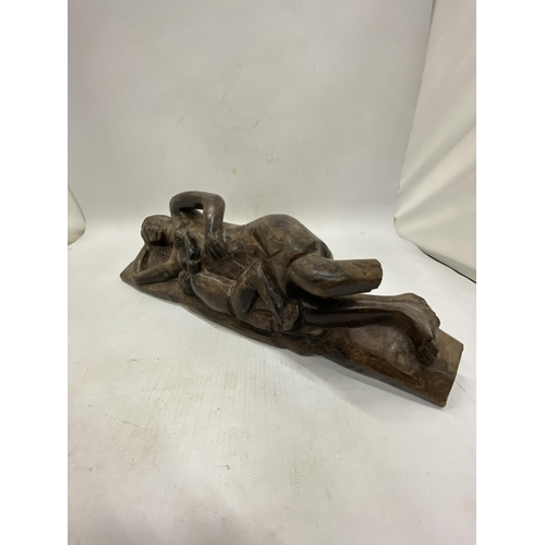 234 - A VINTAGE WOODEN SCULPTURE OF A RECUMBENT LADY, HEIGHT 11CM, LENGTH 34CM