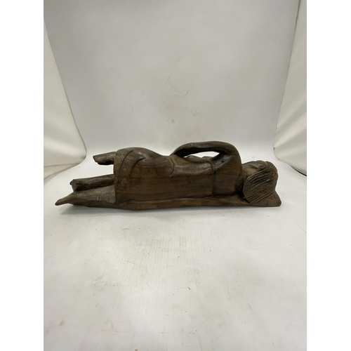 234 - A VINTAGE WOODEN SCULPTURE OF A RECUMBENT LADY, HEIGHT 11CM, LENGTH 34CM