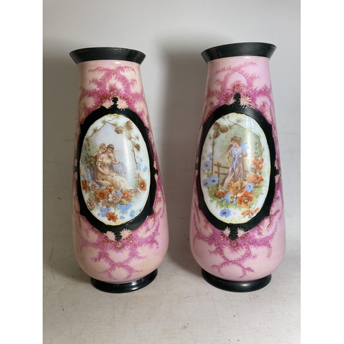 25 - A PAIR OF FRENCH STYLE OPALINE HANDPAINTED VASES WITH TRANSFERS OF FAIR MAIDENS - 33 CM