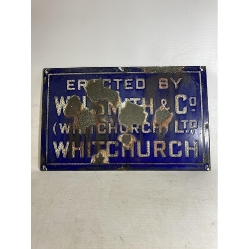 26 - AN ENAMEL SIGN W.H. SMITH WHITCHURCH - 41 X 21.5 CM