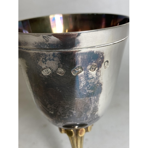 28 - THREE HALLMARKED SILVER ITEMS TO INCLUDE AN E & R ENGRAVED GOBLET, BREAD FORK AND CUT GLASS PERFUME ... 