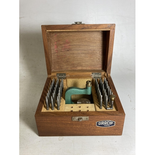 36 - A BOXED LEATHER PUNCH WITH ACCESSORIES