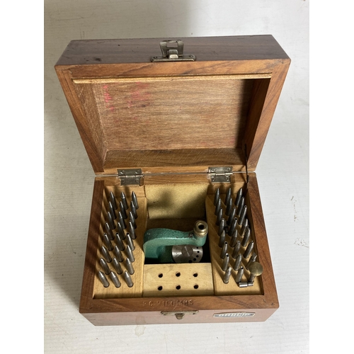 36 - A BOXED LEATHER PUNCH WITH ACCESSORIES