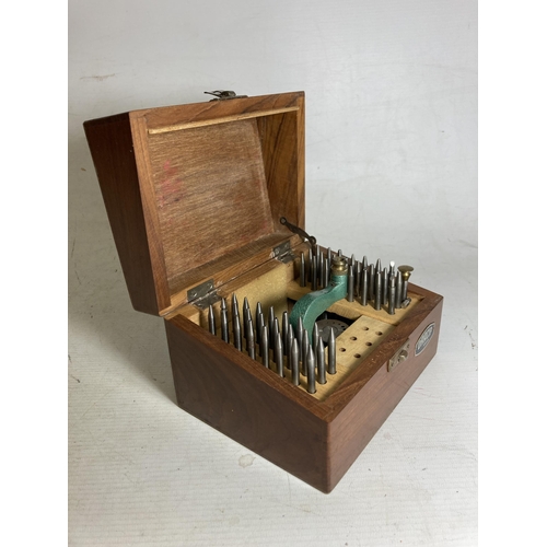 36 - A BOXED LEATHER PUNCH WITH ACCESSORIES