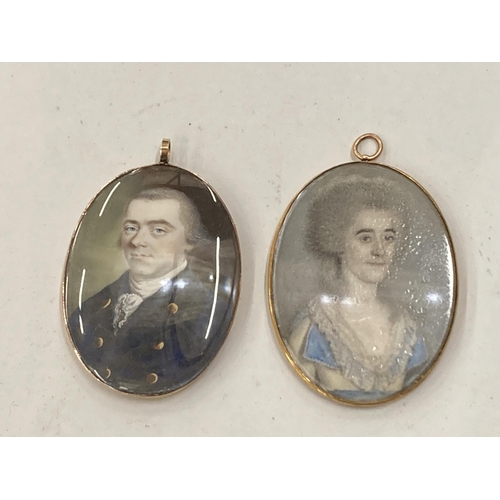 58 - TWO EARLY 19TH CENTURY PORTRAIT MINIATURES WITHIN UNMARKED YELLOW METAL PENDANT MOUNTS