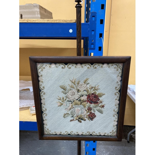 59 - A VICTORIAN ROSEWOOD FIRE SCREEN WITH FLORAL TAPESTRY