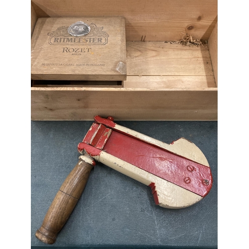 69 - A VINTAGE FOOTBALL FAN PAINTED RATTLE AND TWO VINTAGE BOXES