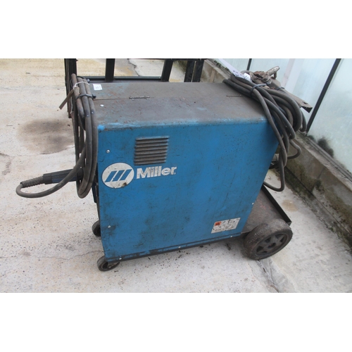 12 - MILLER HEAVY DUTY MIG WELDER IN WORKING ORDER  NO VAT