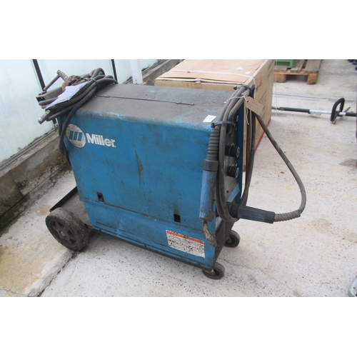 12 - MILLER HEAVY DUTY MIG WELDER IN WORKING ORDER  NO VAT