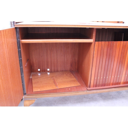 2561 - A RETRO ARNOLD WALNUT RECORD CABINET WITH EIGHTEEN DROP-DOWN STORAGE SECTION ON CABRIOLE LEG, 39.5