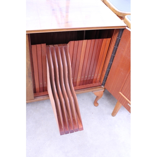 2561 - A RETRO ARNOLD WALNUT RECORD CABINET WITH EIGHTEEN DROP-DOWN STORAGE SECTION ON CABRIOLE LEG, 39.5