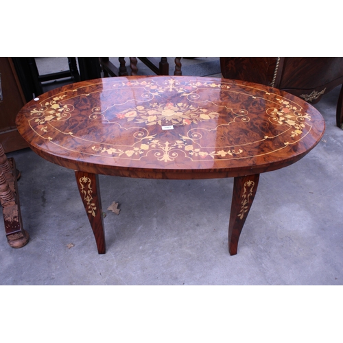 2563 - AN OVAL MARQUETRY INLAID COFFEE TABLE, 44