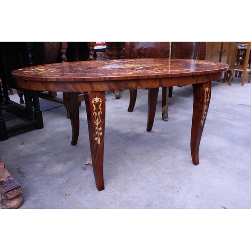 2563 - AN OVAL MARQUETRY INLAID COFFEE TABLE, 44