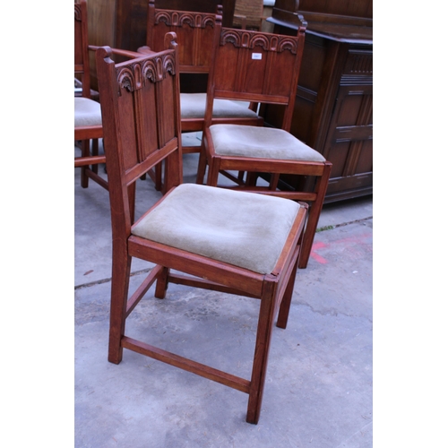 2967 - A SET OF FOUR MID 20TH CENTURY GOTHIC OAK DINING CHAIRS, TWO BEING CARVERS