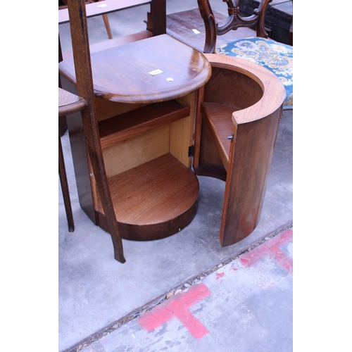 2973 - A WALNUT ART DECO BOW FRONTED CABINET WITH SHELVES AND AN OAK TWO TIER CORNER STAND