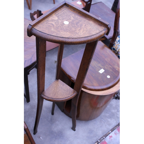 2973 - A WALNUT ART DECO BOW FRONTED CABINET WITH SHELVES AND AN OAK TWO TIER CORNER STAND