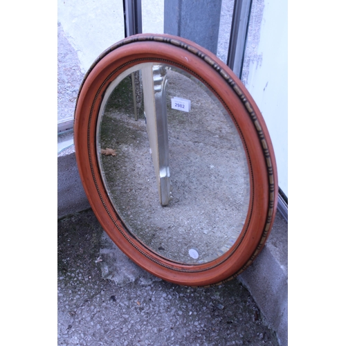 2982 - A 19TH CENTURY STYLE OVAL WALL MIRROR WITH BEVEL EDGE, 23