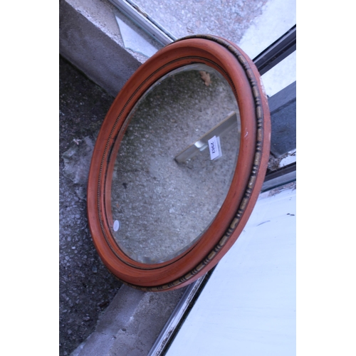 2982 - A 19TH CENTURY STYLE OVAL WALL MIRROR WITH BEVEL EDGE, 23