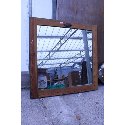 2983 - A PINE FRAMED WALL MIRROR, 44