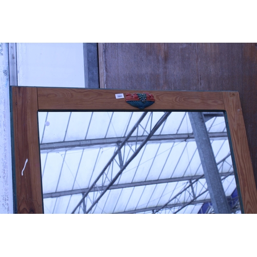 2983 - A PINE FRAMED WALL MIRROR, 44