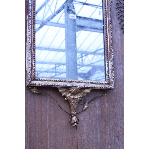 2986 - A 19TH CENTURY STYLE GILT FRAMED WALL MIRROR WITH VASE AND FOLIATE DECORATION, 51