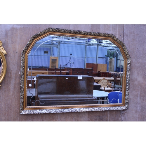 2991 - A SILVER GILT EFFECT BEVEL EDGE WALL MIRROR WITH CANTED TOP, 40