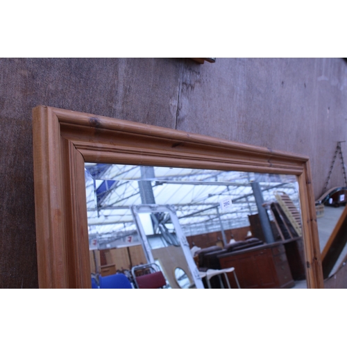 2992 - A PINE BEVEL EDGE WALL MIRROR, 44