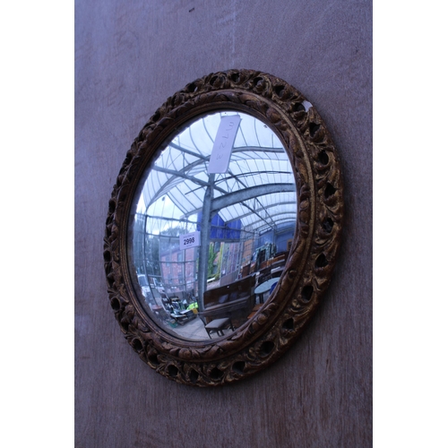 2998 - A GILT FRAMED CONVEX WALL MIRROR, 18