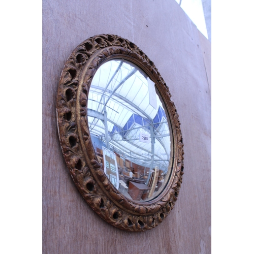 2998 - A GILT FRAMED CONVEX WALL MIRROR, 18