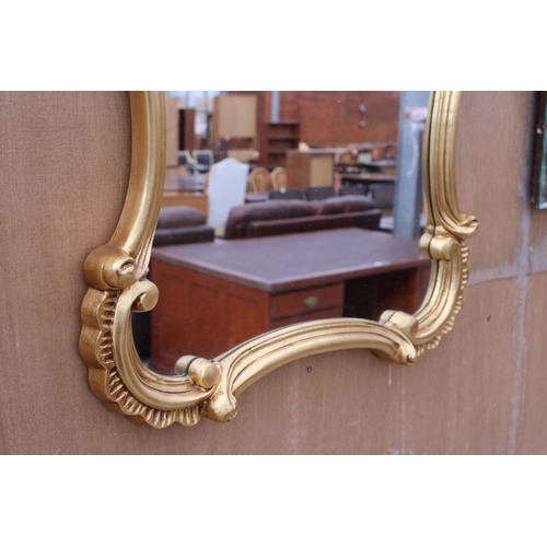 2999 - A 19TH CENTURY STYLE GILT EFFECT WALL MIRROR, 34