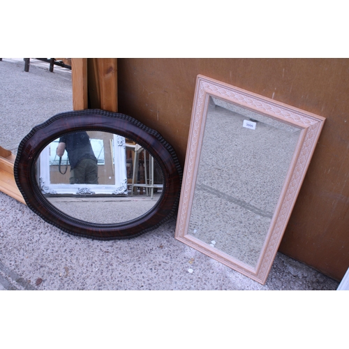 3000 - AN OVAL EDWARDIAN WALL MIRROR AND A BEVEL EDGE MIRROR