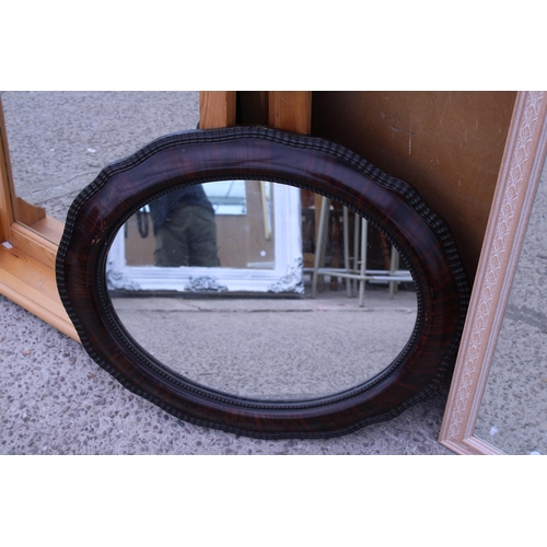 3000 - AN OVAL EDWARDIAN WALL MIRROR AND A BEVEL EDGE MIRROR